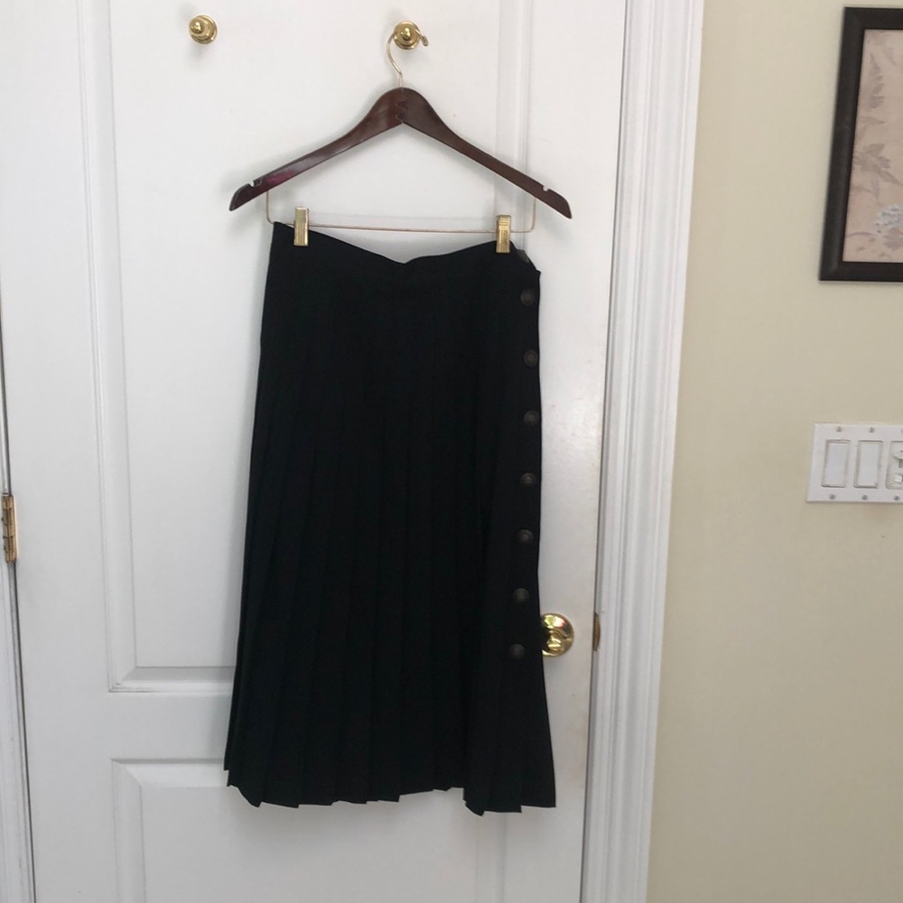 Black pleated skirt with buttons on side